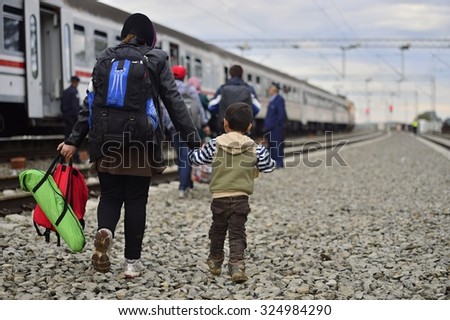 Group of refugees leaving Tovarnik - town on Serbia - Croatia border. They will go into Hungary. October 5,2015; Tovarnik in Croatia