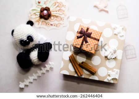 Hand crafted gift set with knitted toy