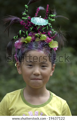 crazy asian hairstyles. asian style hair girl. stock