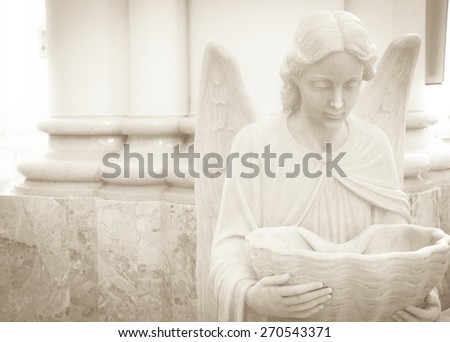 angel statue white bowl prayer offering