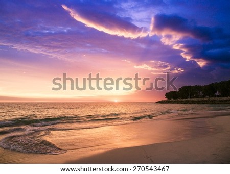 Sunset Australia colorful purple pink gold sky clouds ocean sea water beach