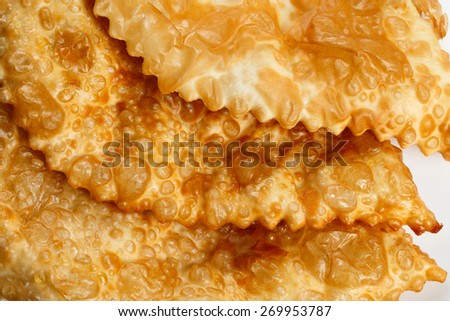Meat Empanada or Cheburek. Meat Pie. traditional snack originally from Spain and Russia