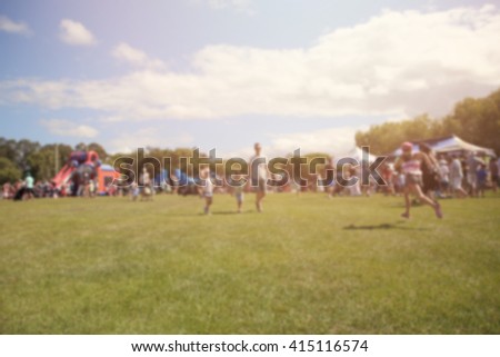 Blur defocused background of people in park fair, summer festival, retro tone