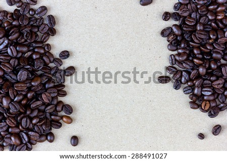 Coffee Beans on old smooth brown paper background
