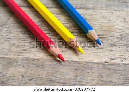 Color pencils on wood background close up ,Color pencils Background texture ,primary color