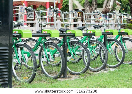 UDONTHANI, THAILAND - August 12: Some bicycles of the bike rental service in Udonthani, Thailand on August 12, 2015. Bike sharing service that people can rent bicycles for short trips.