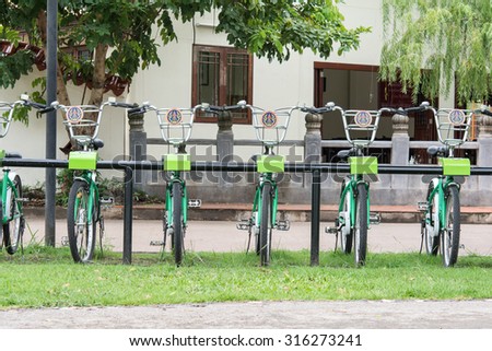 UDONTHANI, THAILAND - August 12: Some bicycles of the bike rental service in Udonthani, Thailand on August 12, 2015. Bike sharing service that people can rent bicycles for short trips.