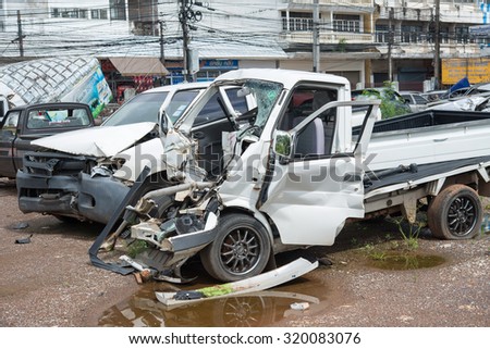 UDONTHANI,THAILAND - AUG 23 : Crushed truck in car graveyard. Accident car in udonthani police station car park on 23 August, 2015.