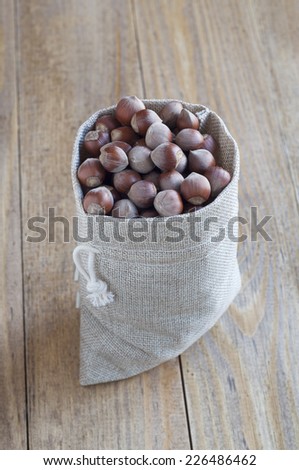 Hazelnuts in a cotton bag.