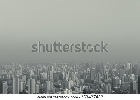 abstract hipster stylized top view foggy big city can use for background with copyspace. black and white vintage fashion style processed