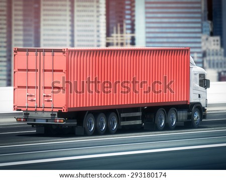 White truck with Red cargo container on blurry asphalt road with city