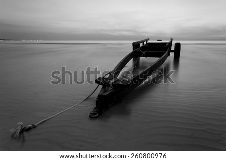 The boat trailer at Kon Ao Beach in black and white, Rayong, Thailand