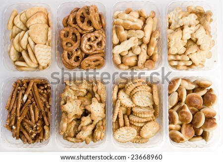 eight kinds of crackers on white ground