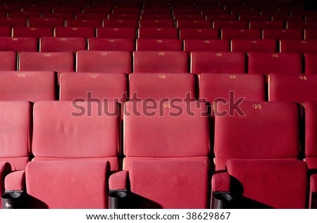 Red concert hall, opera or theater seats.