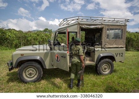 Virunga National Park, DR.Congo - October 7th 2015 - A army soldier in a safari car inside the Virunga National Park in Africa, DRC, Central Africa.