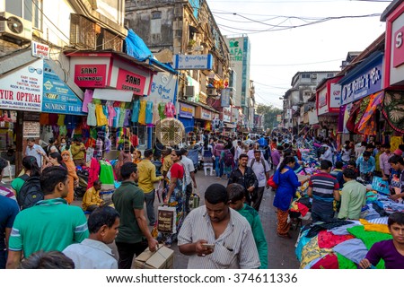Mumbai, India - January 12th 2016 - Huge number of people in a street market in downtown Mumbai, India