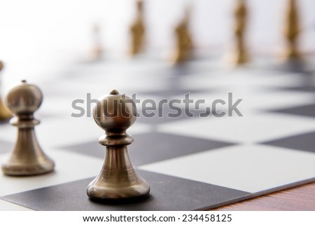 Classic chess strategy game -  - pawns in foreground