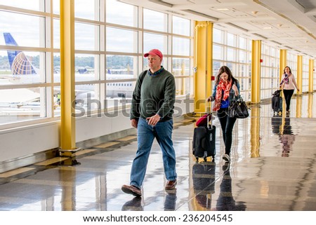 October 2, 2014: DCA, Reagan National Airport, Washington, DC - passengers waiting in the corridor for a flight
