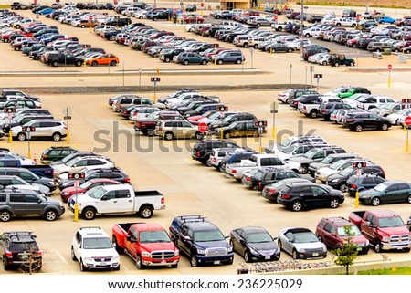 September 12, 2014: DIA, DEN, Denver International Airport - parking lot with cars