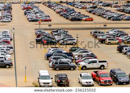 September 12, 2014: DIA, DEN, Denver International Airport - parking lot with cars