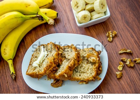 fresh banana nut bread with walnuts and butter