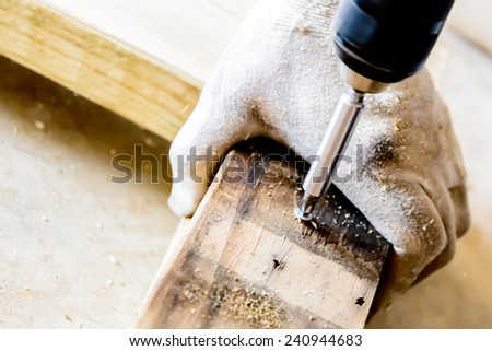 hand and tools doing wood work construction project