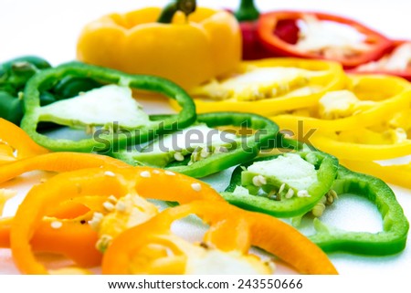 red, green, yellow, orange sliced bell pepper