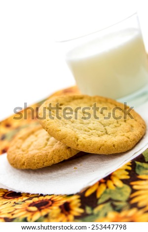glass of milk and plain sugar cookies