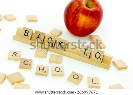 December 19, 2014: Houston, TX, USA (Illustrative Editorial) - Scrabble word game wood tiles spelling Back To School