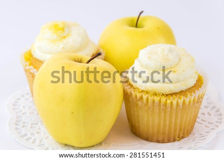 yellow apple vs yellow cupcake - snack decision between healthy food or junk food