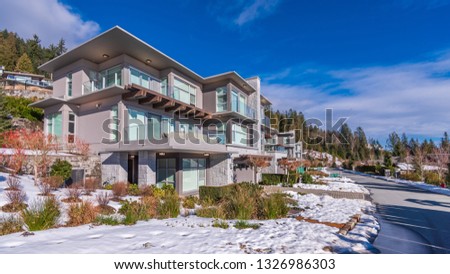 Houses in suburb at Winter with nice landscape in the north America. Luxury houses covered nice snow.