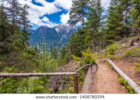 View at Mountain Trail in British Columbia, Canada. Mountains Background.