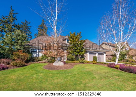 Houses in suburb at Summer in the north America. Luxury houses with nice landscape.