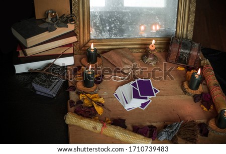 Tarot cards and esoteric concept. Magic rituals. Mystical table with details
