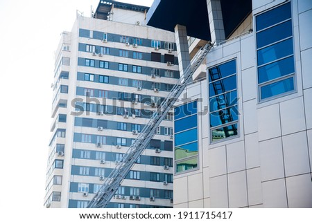 A sliding fire escape is used by emergency services to allow access to the building