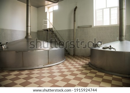 Modern Beer Factory. Steel tanks for beer fermentation and maturation.