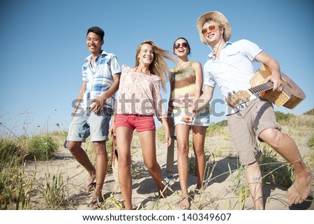 Group Of Young People Camping Or Going On A Day Trip