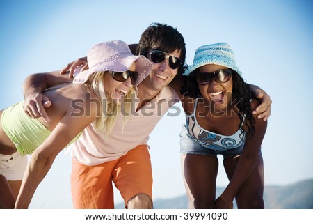 young people at the beach having fun