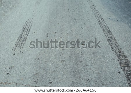 asphalt road with tire mark