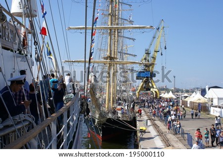 PORT CONSTANTA,ROMANIA - MAY 25,2014. People who visits the sailboats who participate at the competition THE BLACK SEA TALL SHIPS REGATTA 2014.