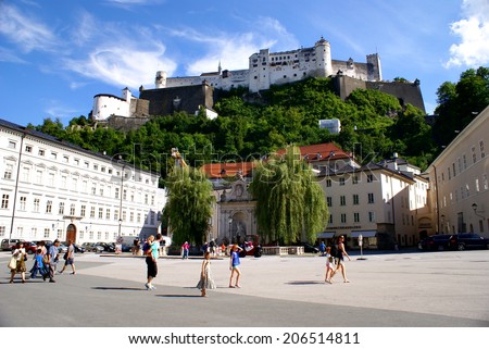 SALZBURG,AUSTRIA - JULY 16 ,2014.People at  the historical center of the famous Unesco heritage city of Salzburg, city where Mozart was born.