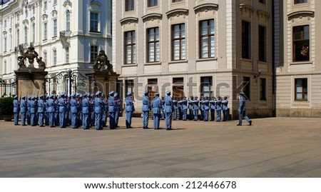 PRAGUE, CZECH REPUBLIC - JULY 19, 2014. Changing of the Guards Ceremony  takes place in the first courtyard of  Prague Castle at 12.00 daily and is a famous attraction for many tourists.