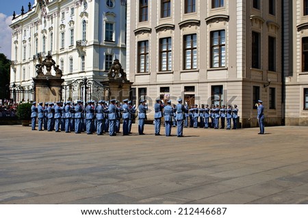 PRAGUE, CZECH REPUBLIC - JULY 19, 2014. Changing of the Guards Ceremony  takes place in the first courtyard of  Prague Castle at 12.00 daily and is a famous attraction for many tourists.