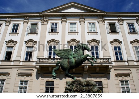 SALZBURG,AUSTRIA - JULY 16, 2014. Pegasus sculpture in the Mirabell Garden ,Salzburg, Mirabell  Garden -   big attraction for many tourists.