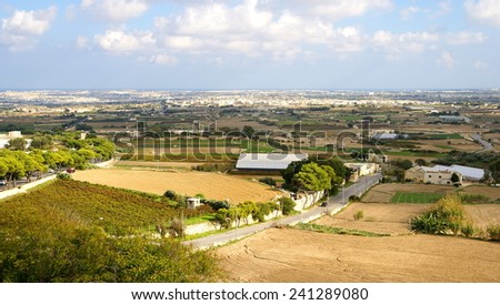 ISLAND OF MALTA - NOVEMBER 3, 2014. Autumn maltese landscape ,village with cultivated fields View from  the  old restaurant Point  De Vue .