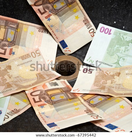 Euro bank notes in the outflow