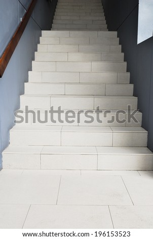 Blank stairways with wood railing.Stairway to the dark