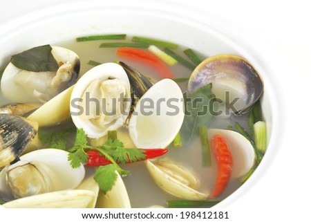 Tom yum or tom yam is a spicy clear soup typical in Laos and Thailand.