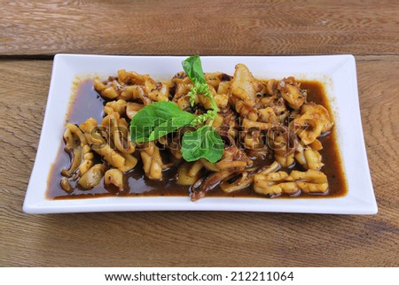 squid. Chinese stir-fried squid with black pepper , garlic and soy sauce asia food