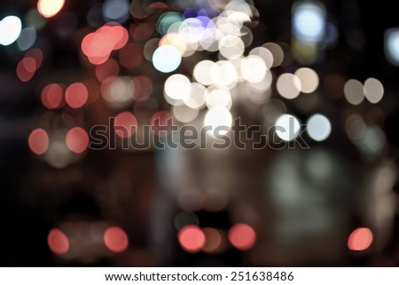 Vintage abstract blur bokeh of Evening traffic jam on road in city , vintage effect